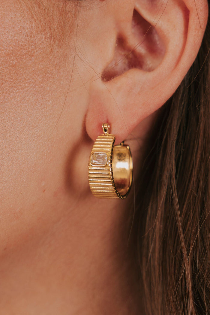 gold hoop earrings with texture and cubic zirconia