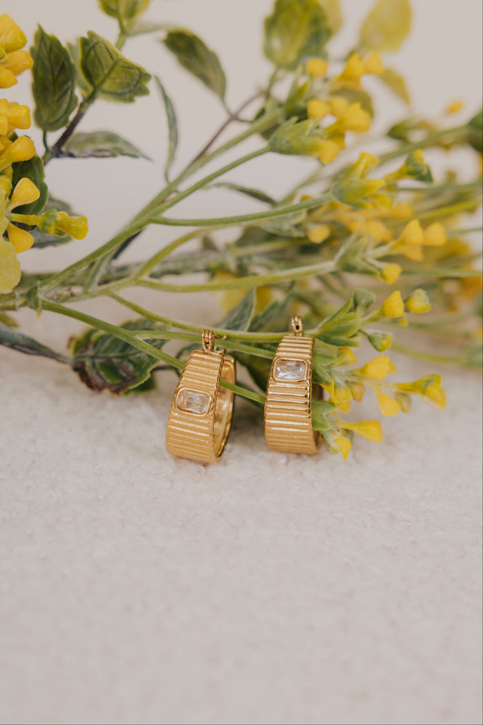 gold hoop earrings with texture and cubic zirconia