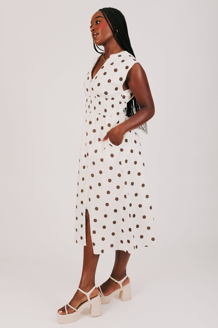 cream and brown polka dot dress with front zipper side
