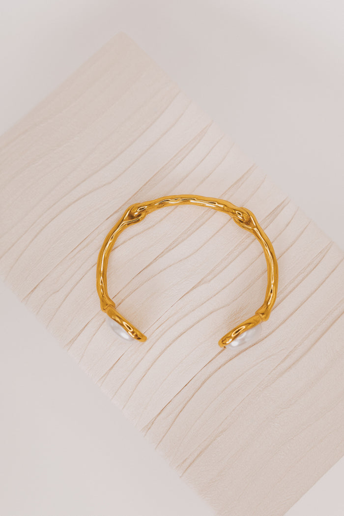 textured gold bracelet with pearl accents top