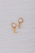 gold hoop huggie earrings with cowboy boot dangle