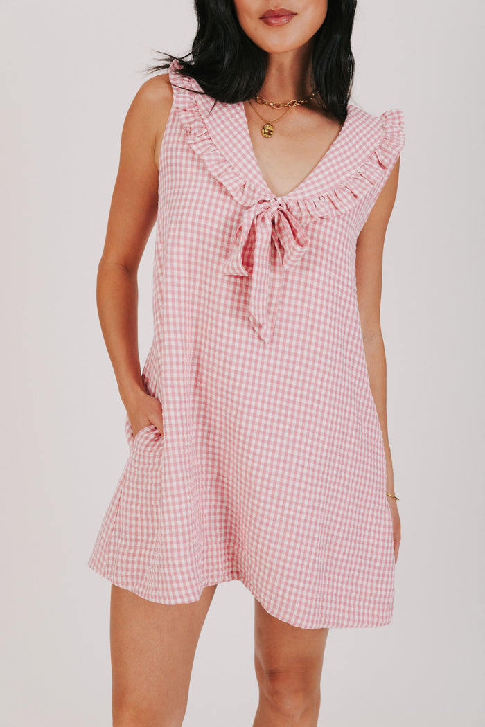 pink gingham sleeveless dress with oversized collar