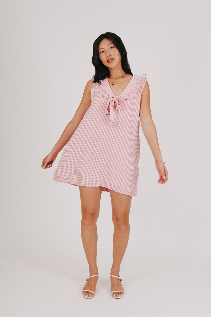 pink gingham sleeveless dress with oversized collar