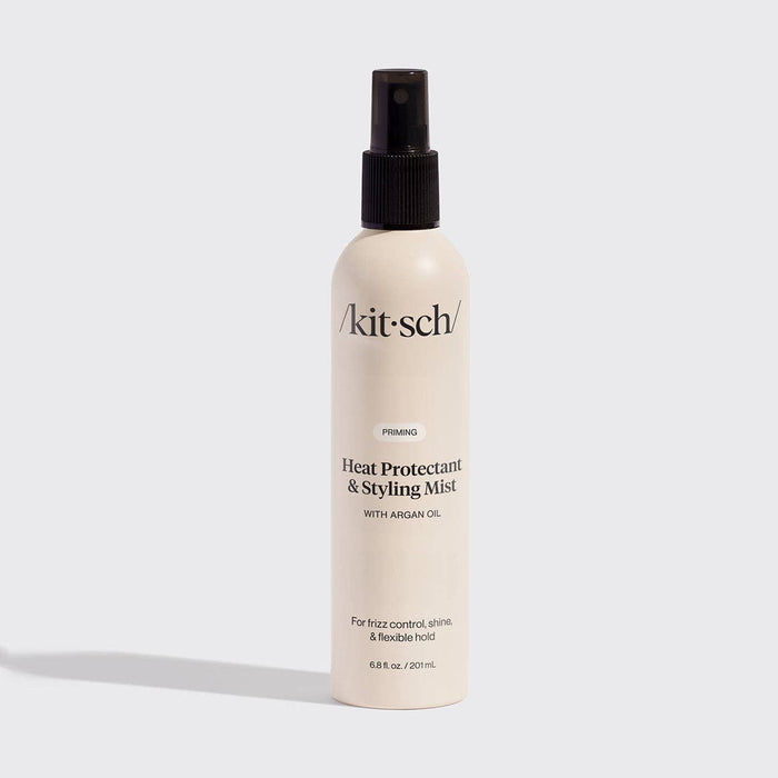 Kitsch heat protectant and styling mist bottle on a white background