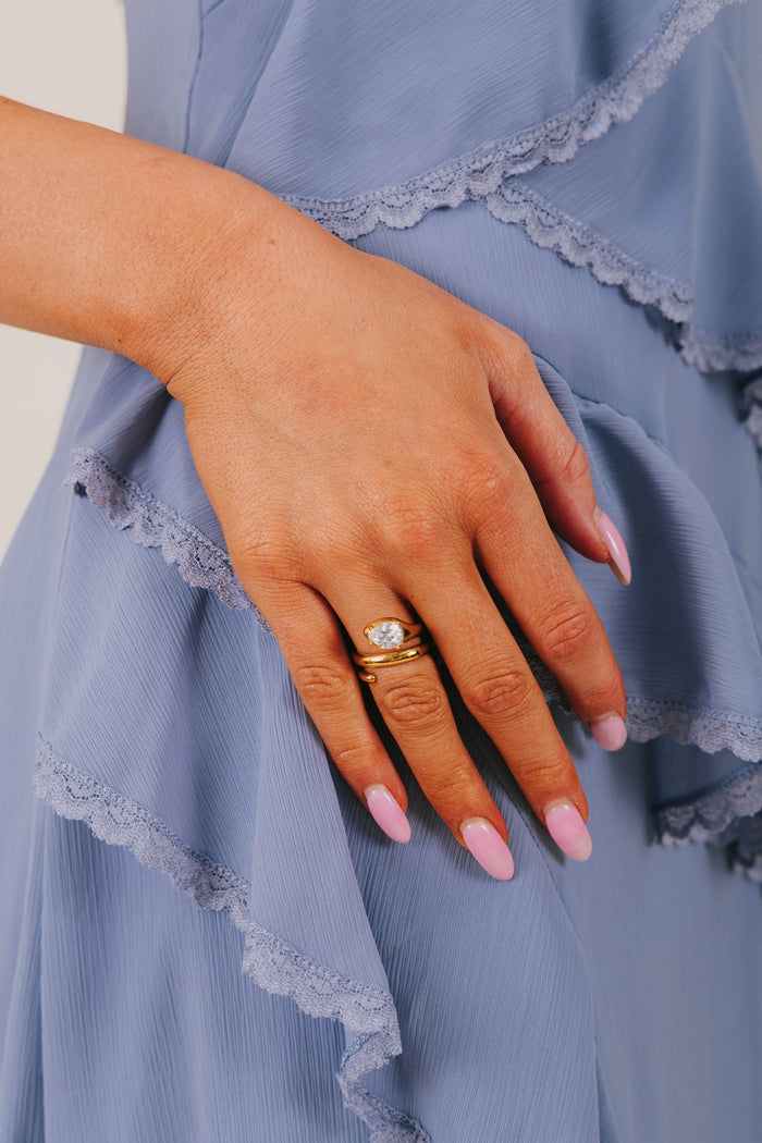 Gold spiral ring with diamond detail