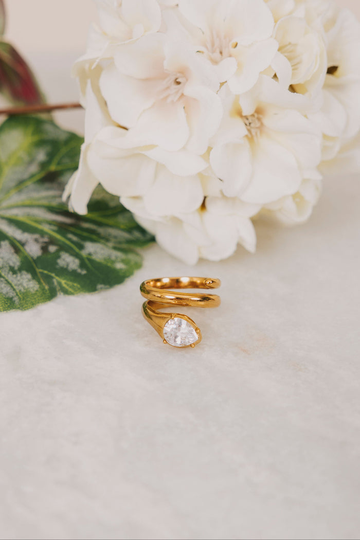 Gold spiral ring with diamond detail