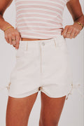white denim shorts with ties on the side