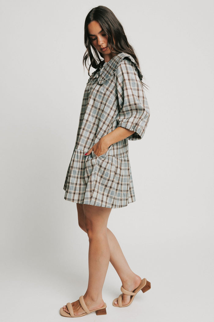 blue plaid mini dress with collar and puff sleeves side