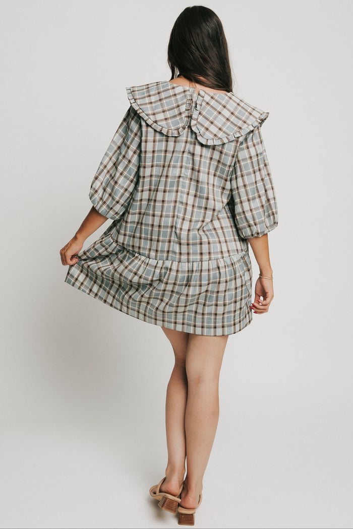 blue plaid mini dress with collar and puff sleeves back