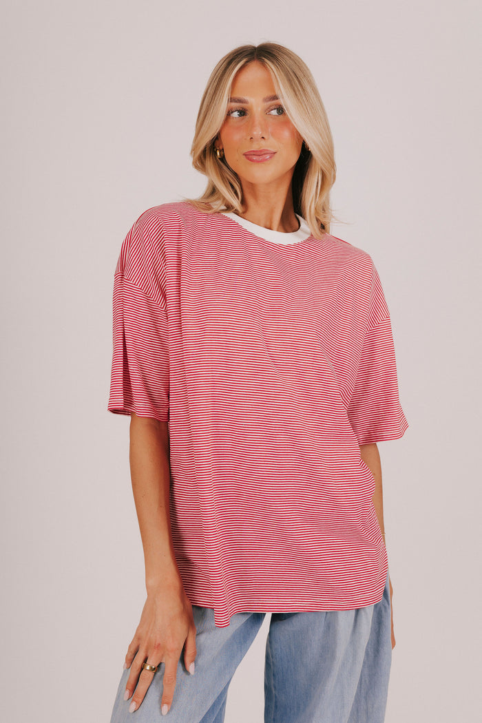 Striped short sleeve t-shirt with a contrast crew neck and split hem