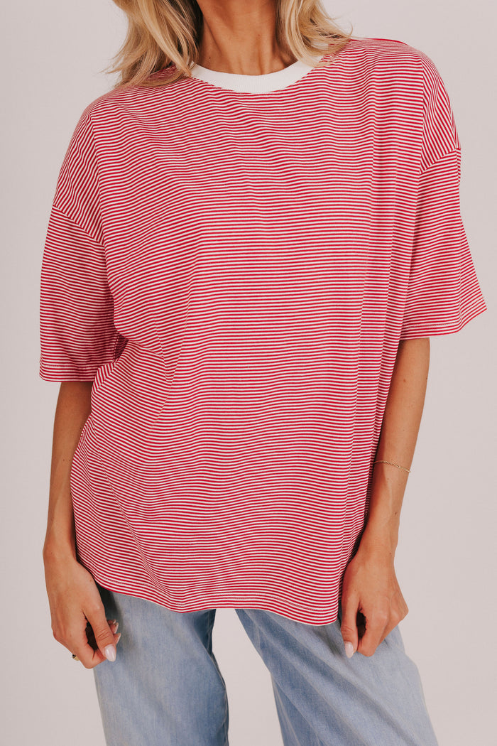 Striped short sleeve t-shirt with a contrast crew neck and split hem