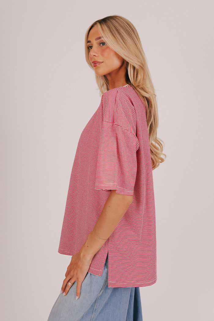 Striped short sleeve t-shirt with a contrast crew neck and split hem