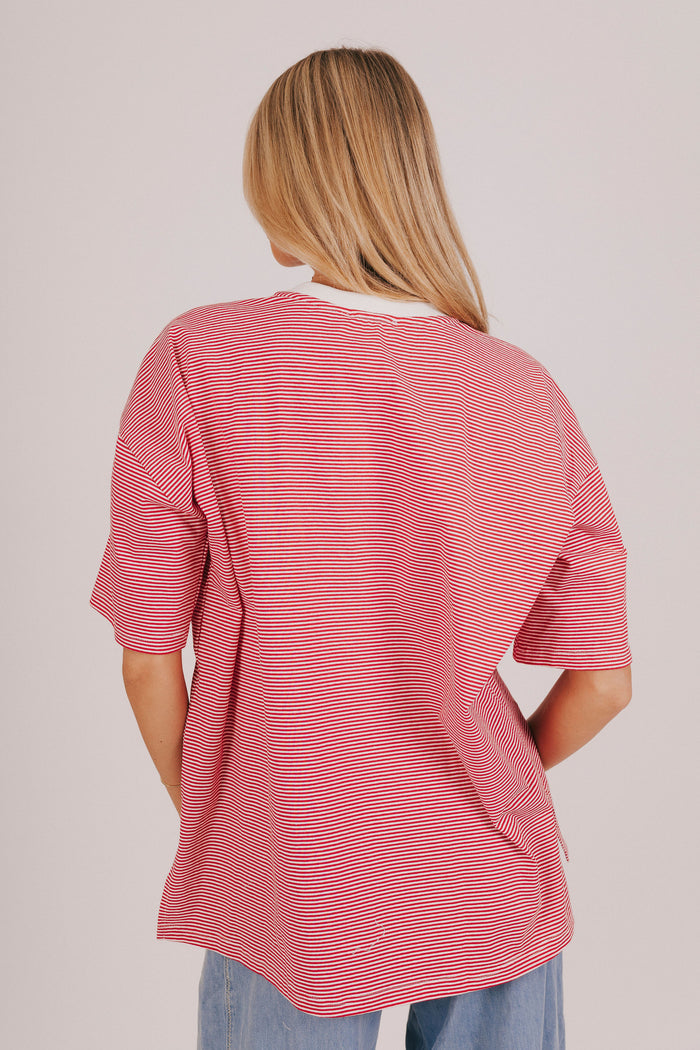 Striped short sleeve t-shirt with a contrast crew neck and split hem