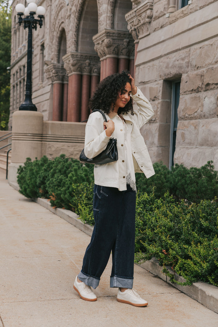 white oversized denim jacket with brown collar