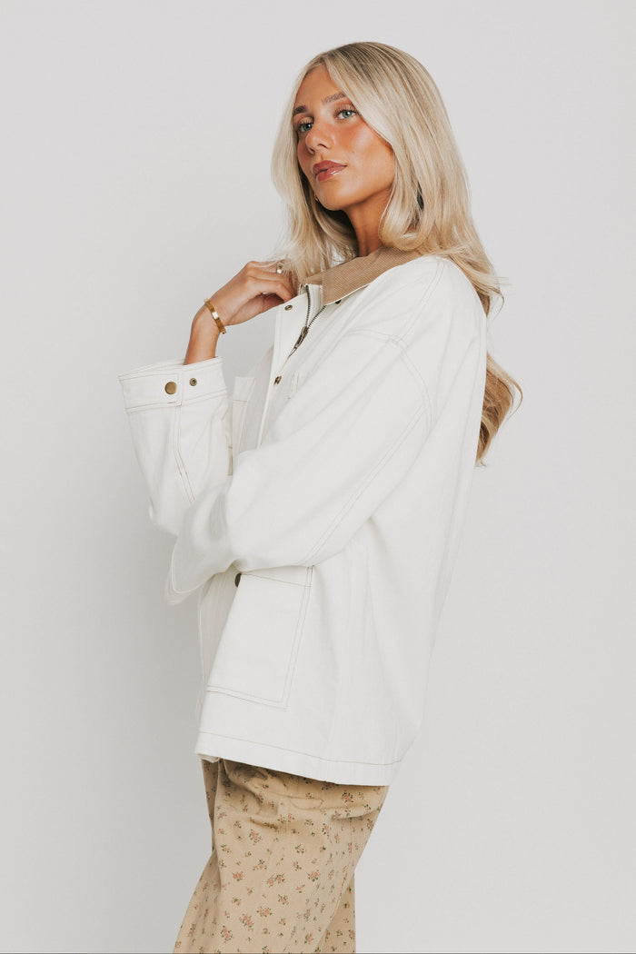 white oversized denim jacket with brown collar side