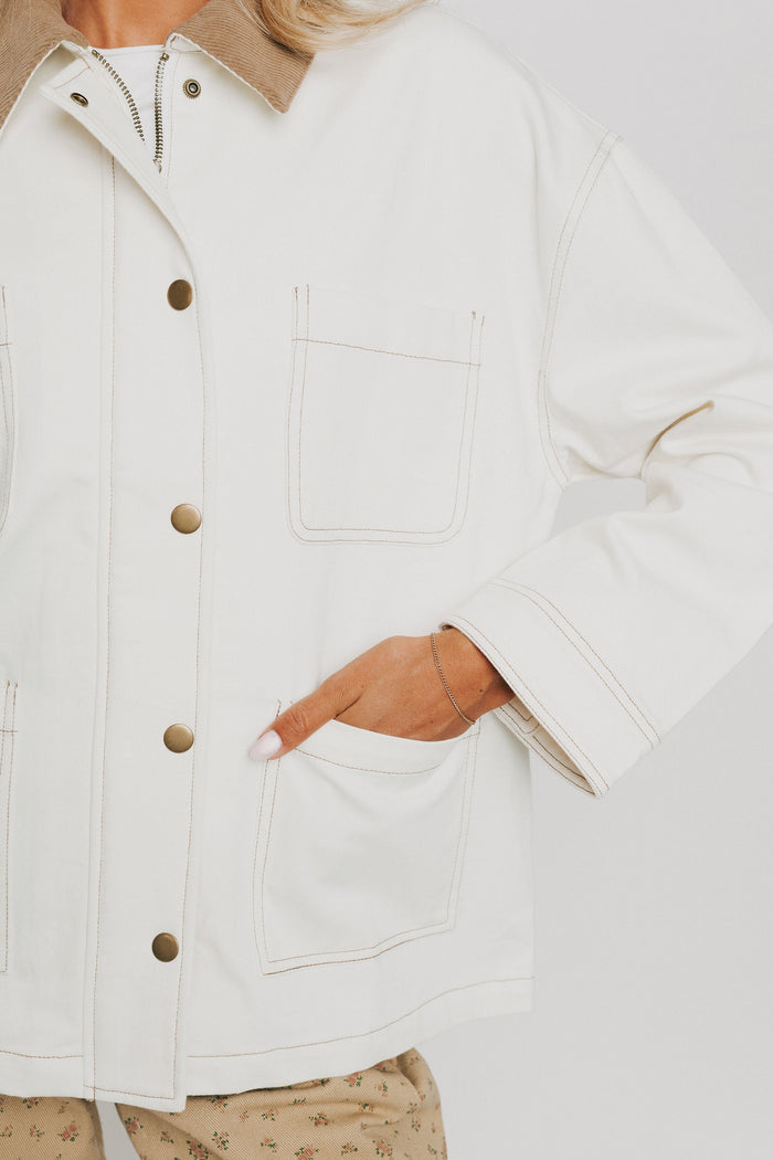 white oversized jacket with brown collar