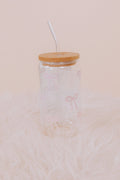 Clear glass tumbler with wooden lid and straw with pink bow details