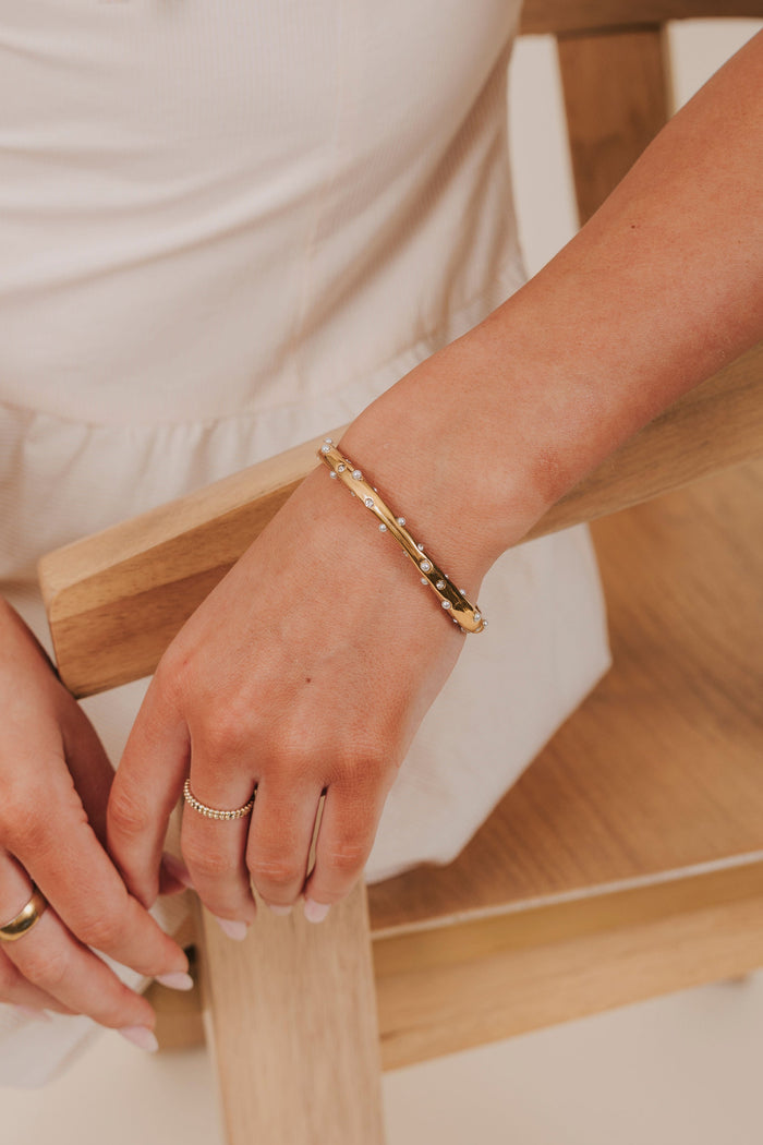 gold cuff bracelet pearl diamond details