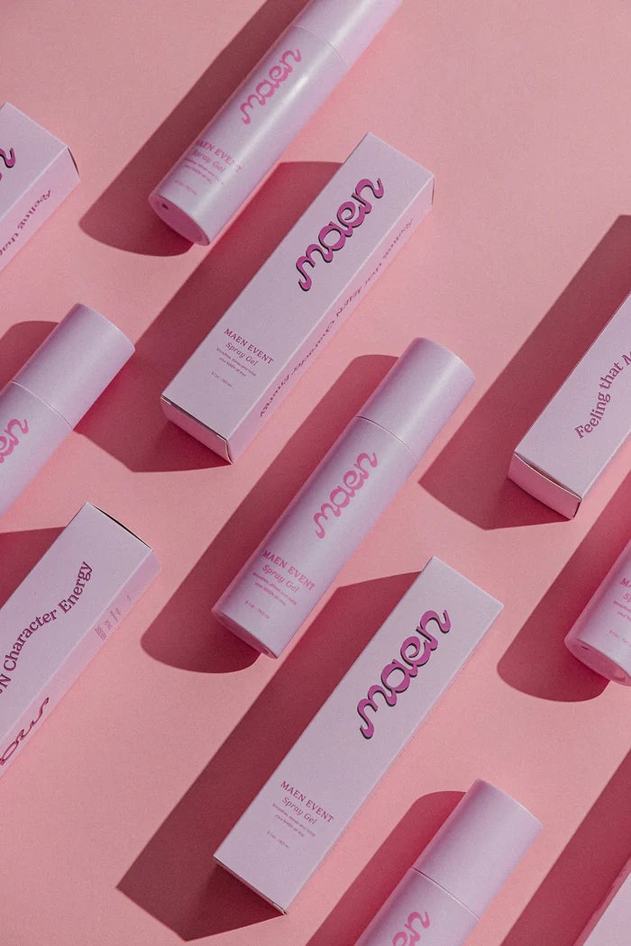 maen hair care products on a pink background