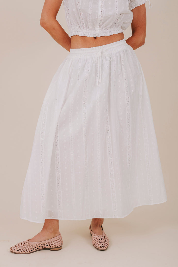 white eyelet elastic bow button skirt front