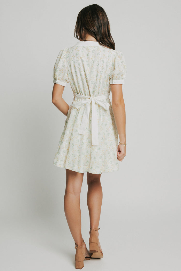 light floral mini dress with collar and puff sleeves back