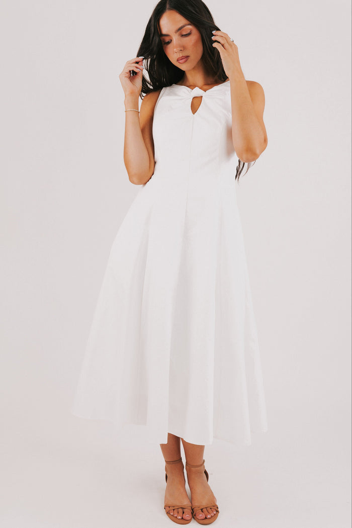white midi dress with knot and keyhole