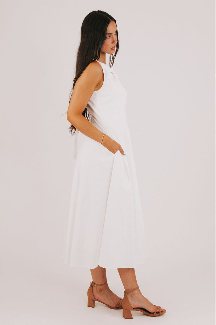 white midi dress with knot and keyhole side