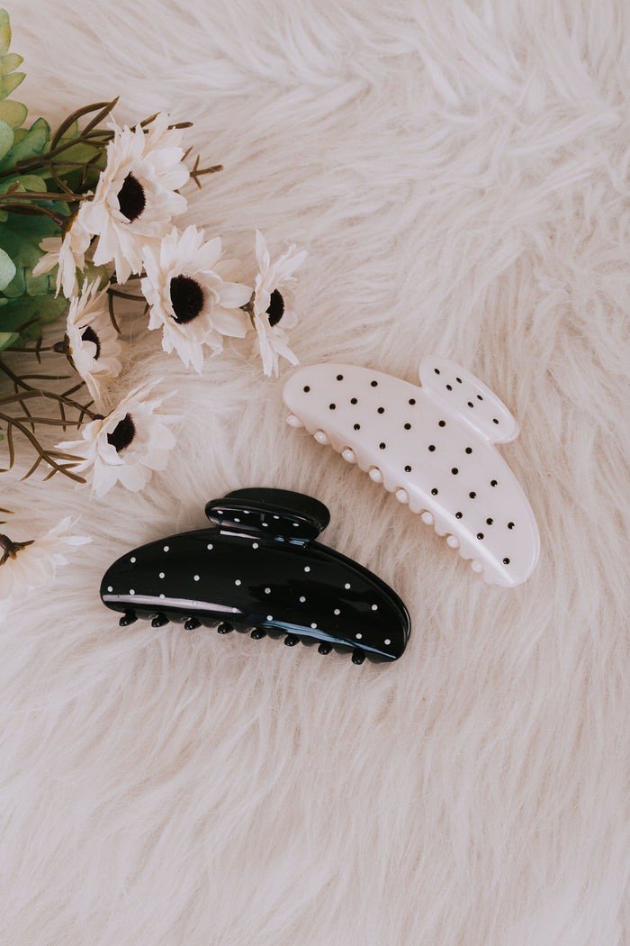 white and black claw clips with polka dots