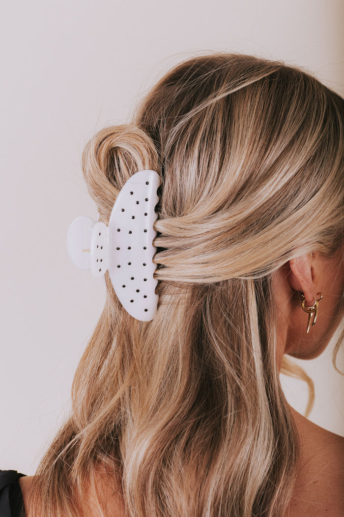 white claw clip with black polka dots