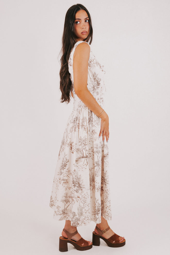 white sleeveless basque waist dress with brown floral print