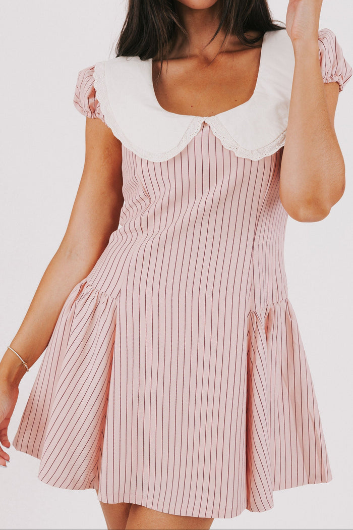 pink striped mini dress with white collar and puff sleeves front