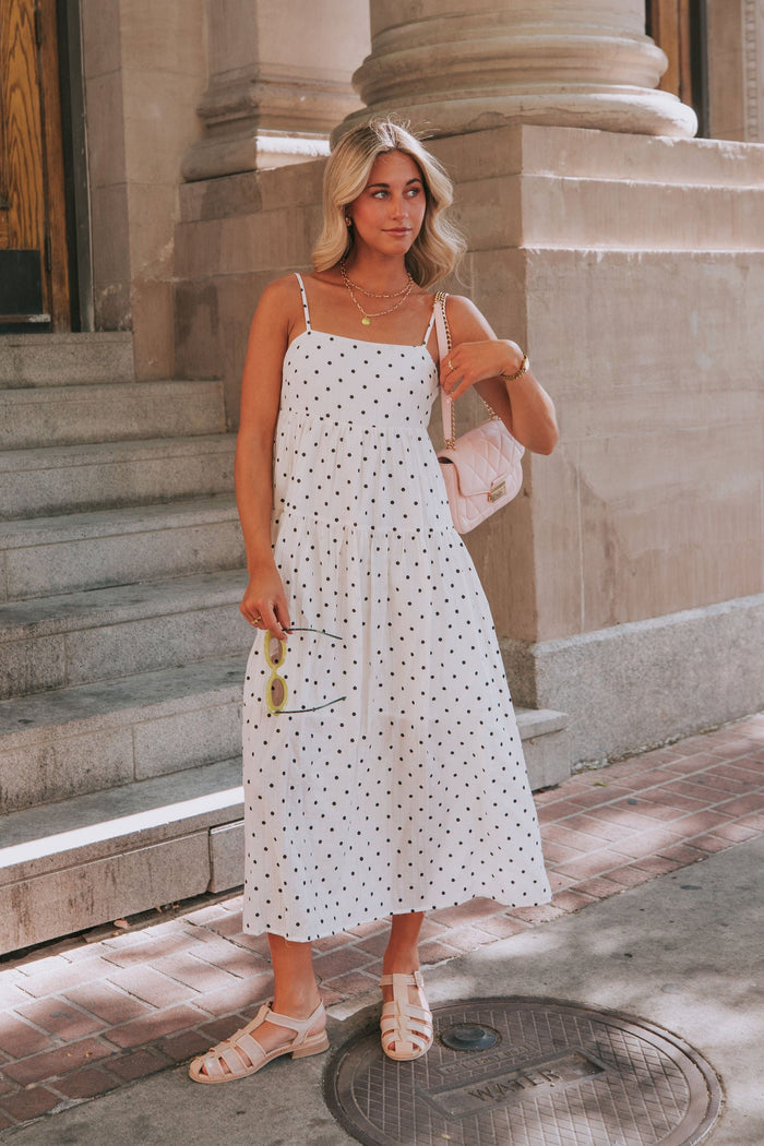 Cream midi/maxi dress with black polka dots. Tiers, pockets, lined, spaghetti straps