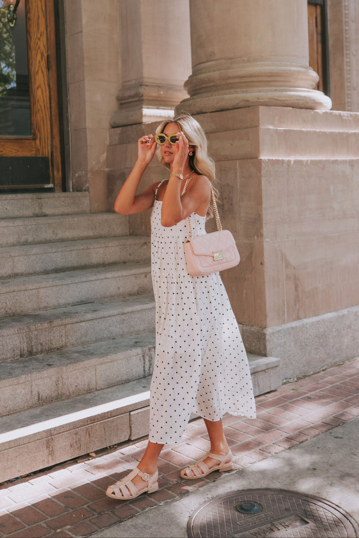 Cream midi/maxi dress with black polka dots. Tiers, pockets, lined, spaghetti straps
