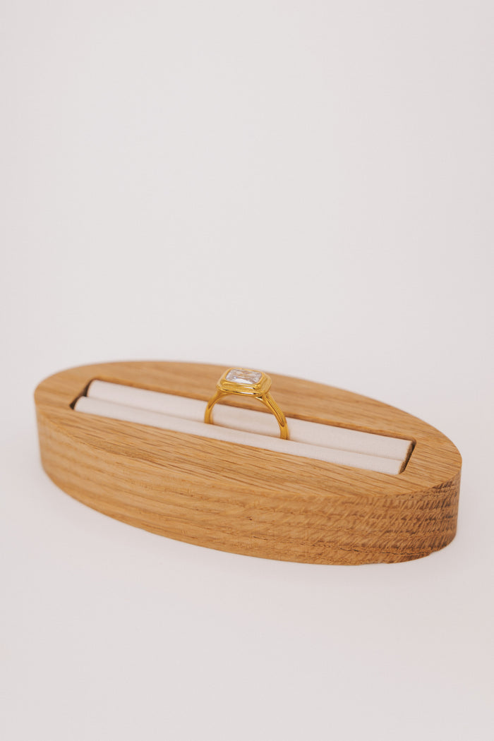 gold ring with stone in the center