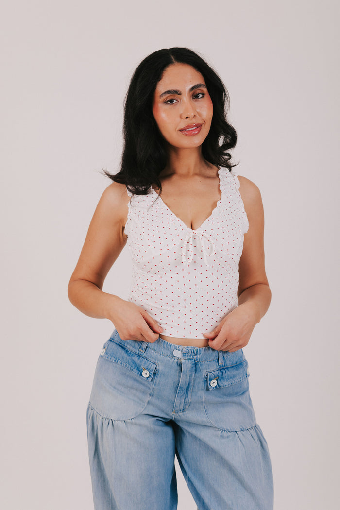 white v neck tank with red polka dots