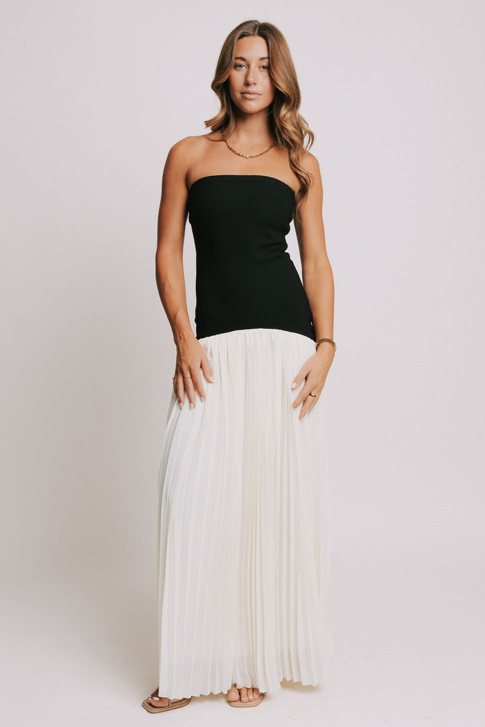 strapless maxi dress with black bodice and white pleated skirt full