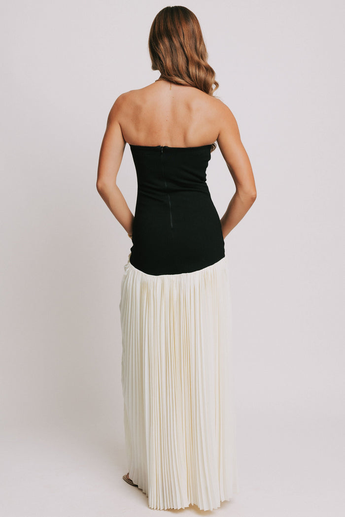 strapless maxi dress with black bodice and white pleated skirt back