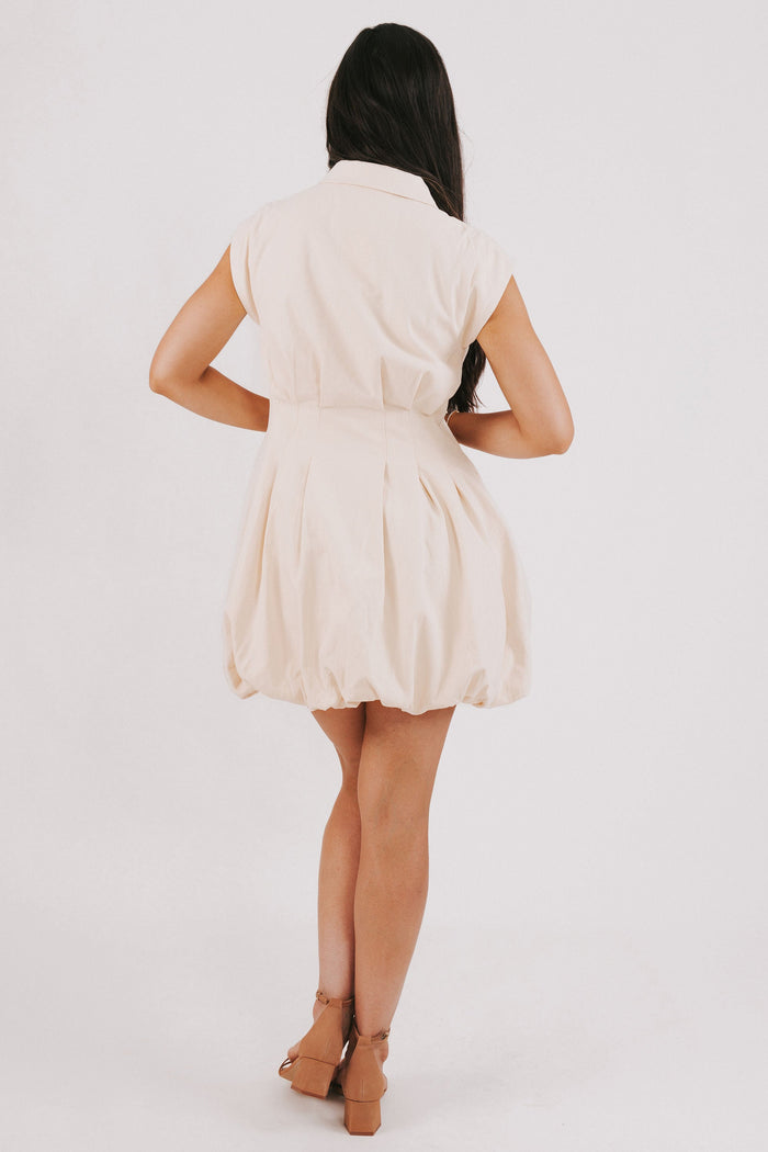 ivory zip up bubble hem dress back