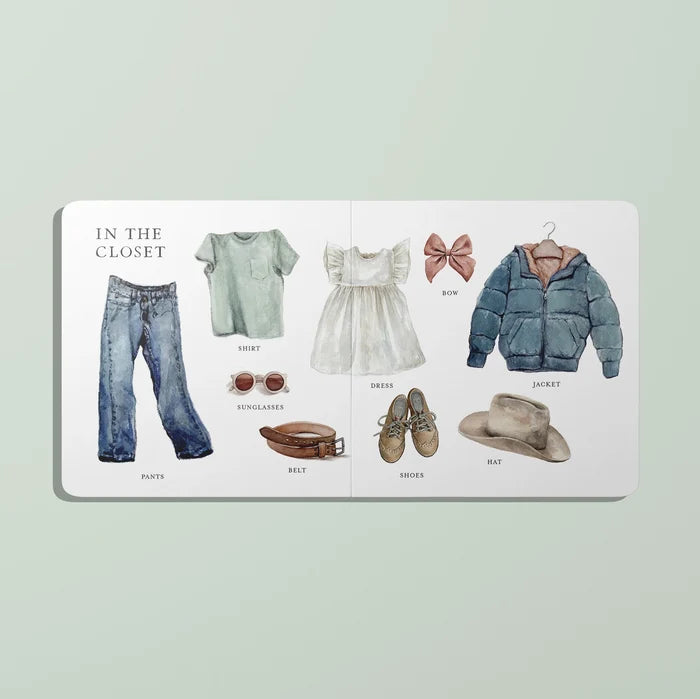 Illustrated children's book open to a page titled 'In the Closet' with clothing items
