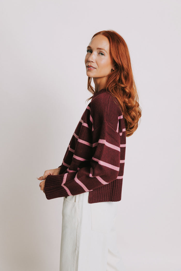 pink and burgundy striped sweater side
