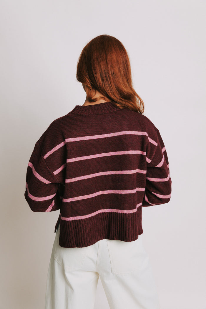 pink and burgundy striped sweater back