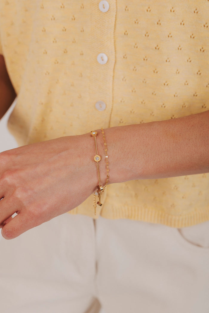 Gold stainless steel bracelet with roman numeral clock face and double layer