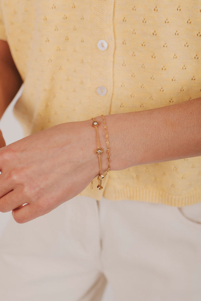 Gold stainless steel bracelet with roman numeral clock face and double layer