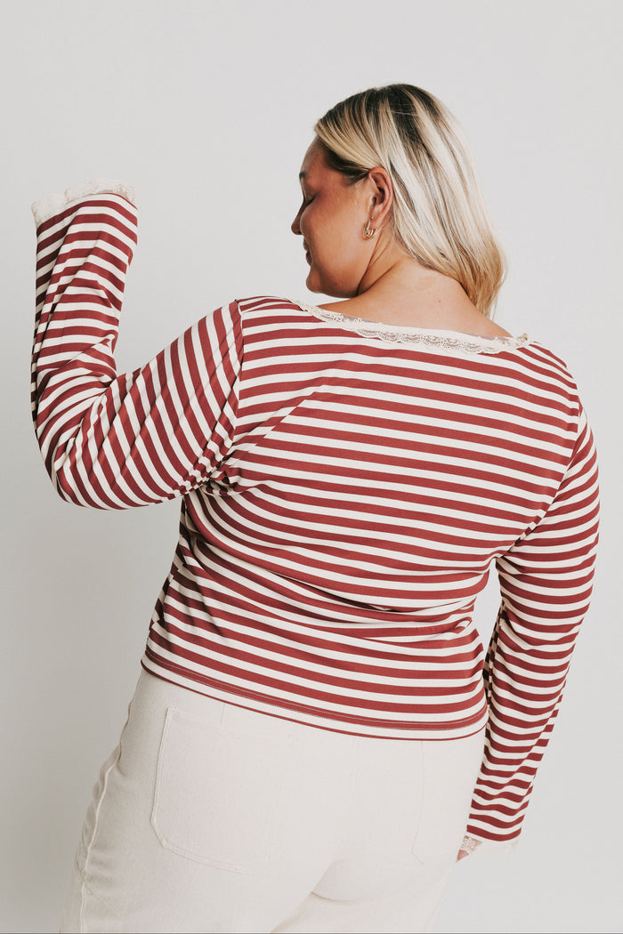 burgundy striped top with lace trim on neckline and sleeves back