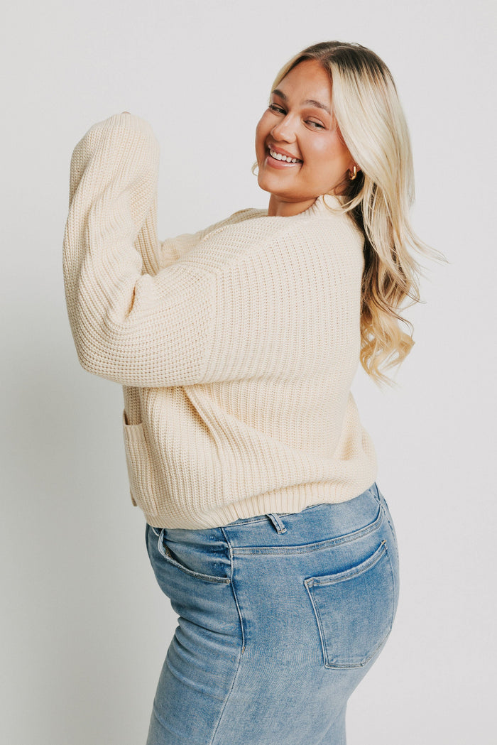 cream button down knit cardigan with pockets plus side