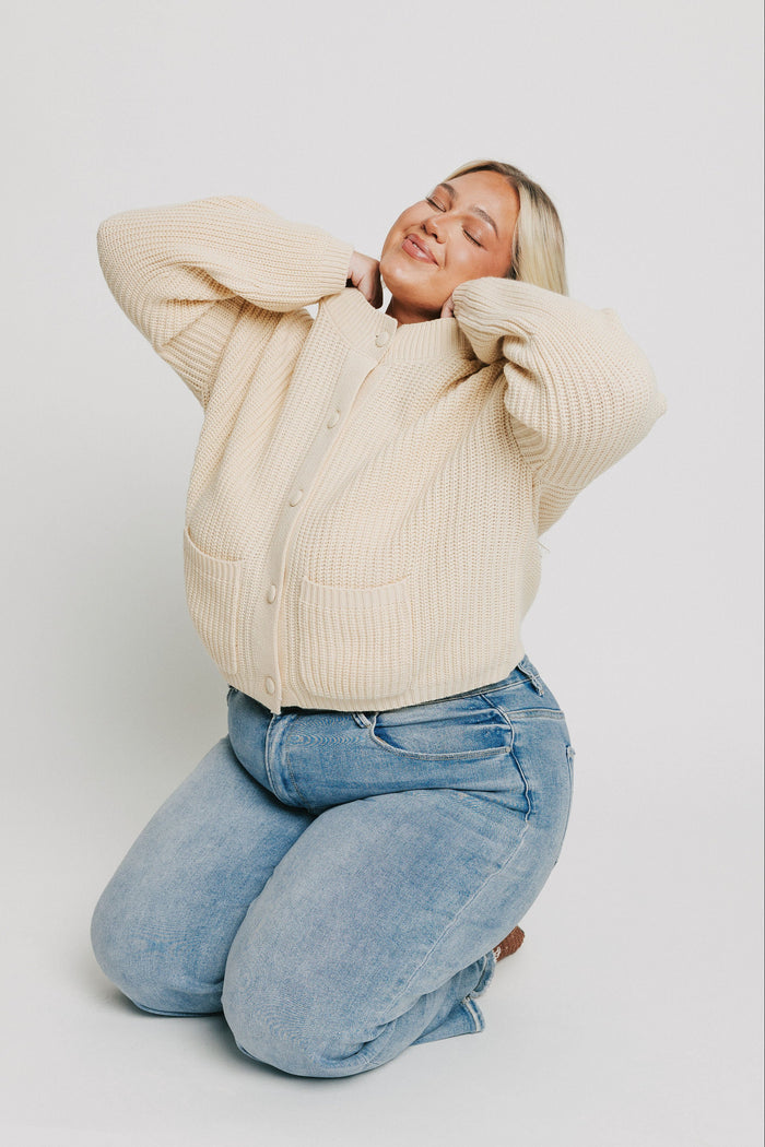 cream button down knit cardigan with pockets plus pose