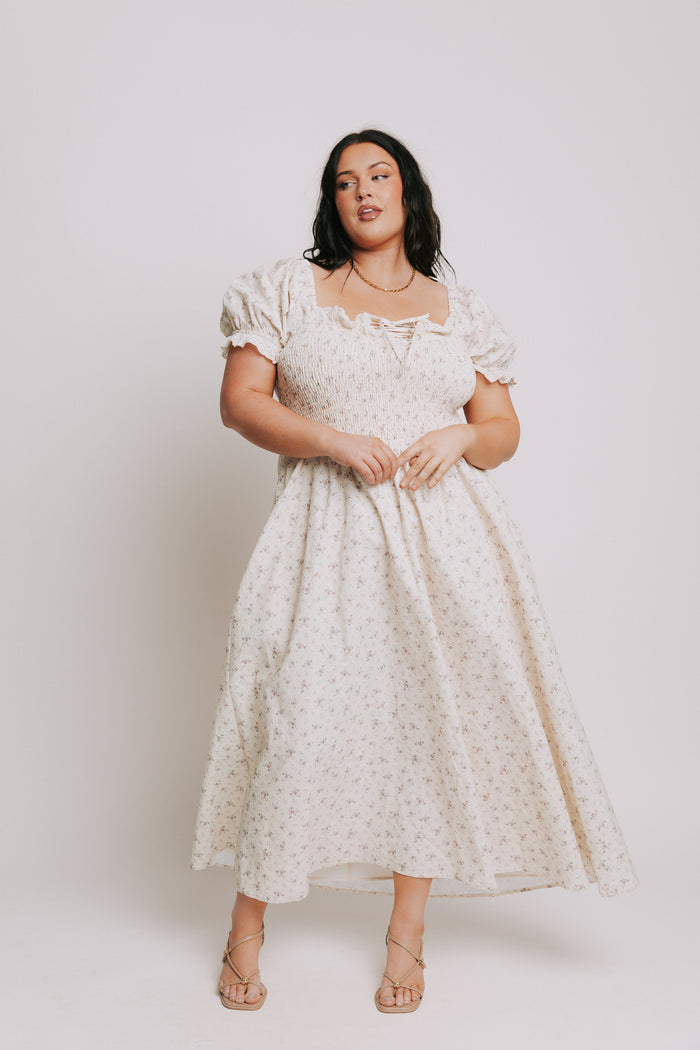 ivory floral dress with lace up detail and eyelet trim plus