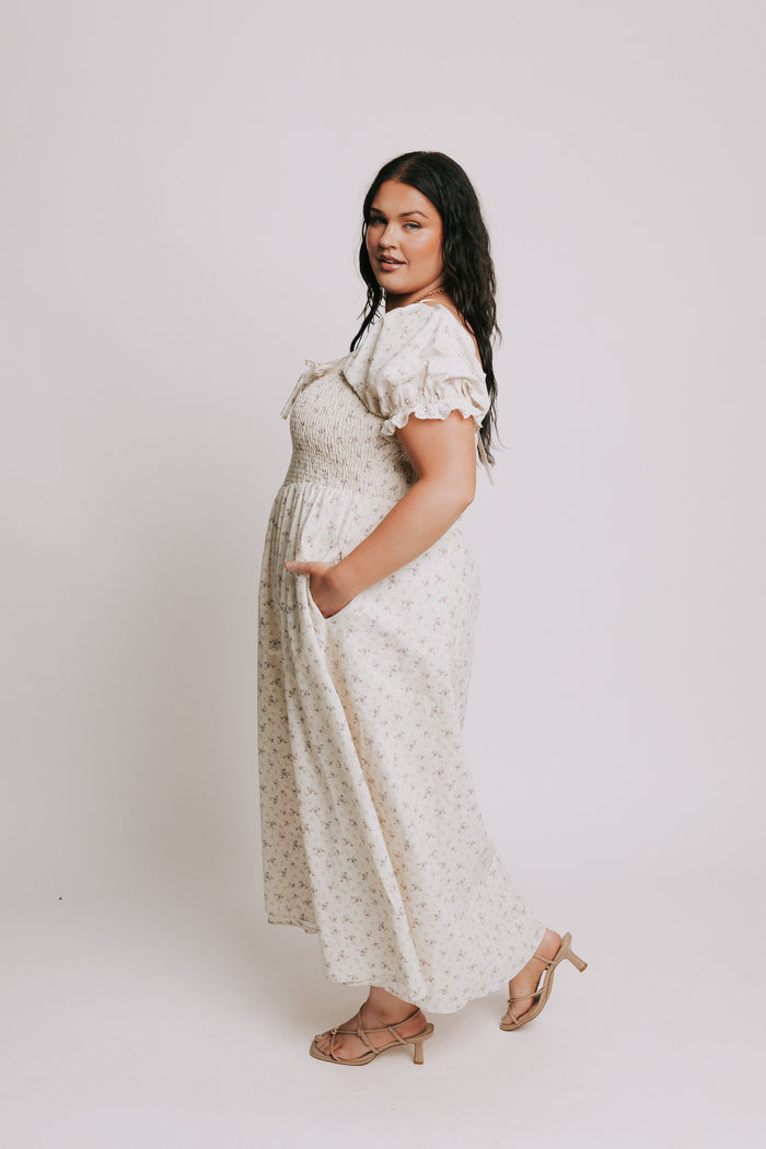 ivory floral dress with lace up detail and eyelet trim plus side