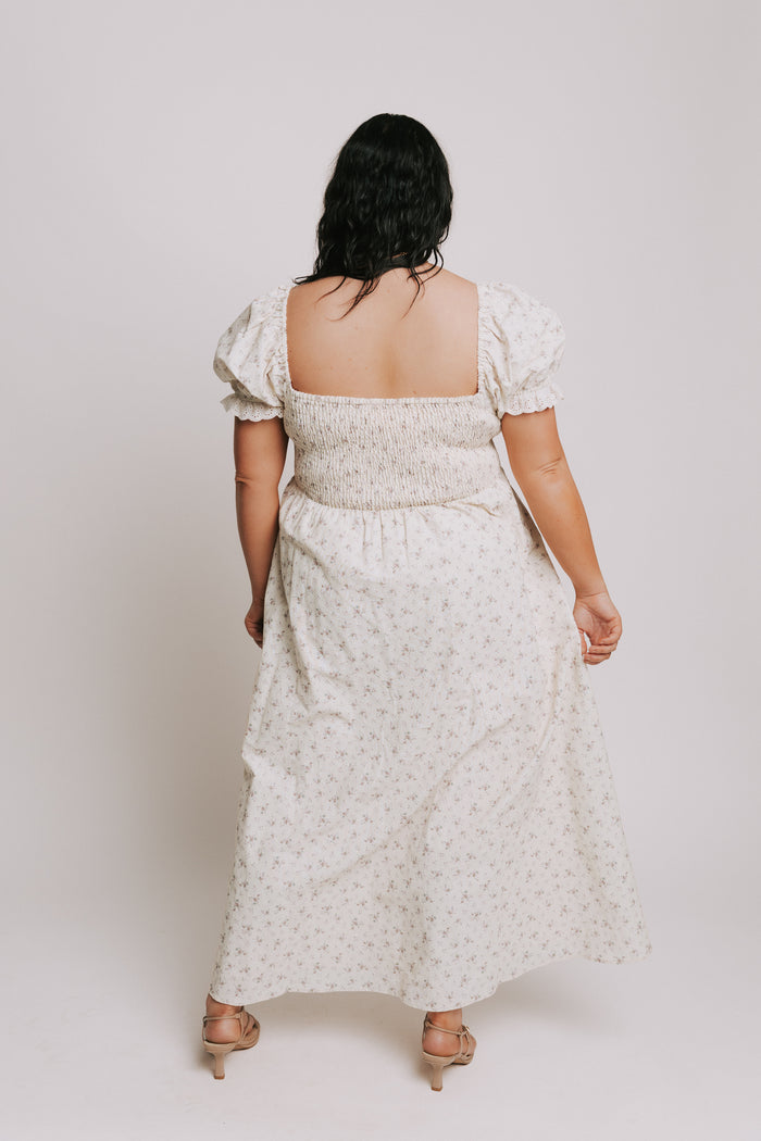 ivory floral dress with lace up detail and eyelet trim plus back