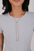 Gold plated snake chain necklace that's slider style with ball bead accents